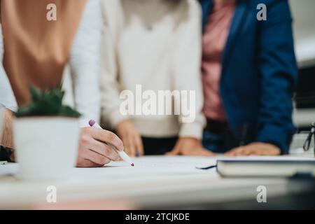 Successful Career. Corporate Team Analyzing Reports and Brainstorming for Business Growth. Stock Photo