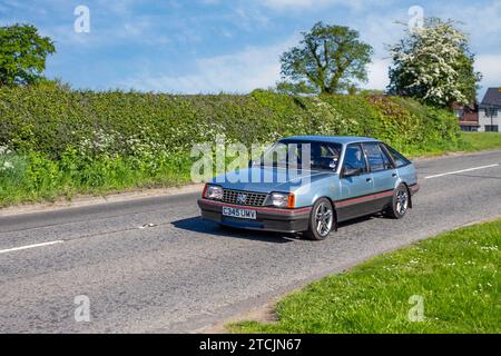 1986 80s eighties Blue Vauxhall Cavalier Mk2b 1798cc petrol saloon. Vintage, restored classic motors, automobile collectors motoring enthusiasts, historic veteran cars travelling in Cheshire, UK Stock Photo