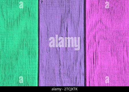 Vintage wood background and texture with colourful peeling paint. Stock Photo