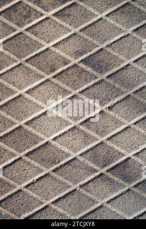 Old rusty diamond metal plate texture pattern used as abstract background Stock Photo