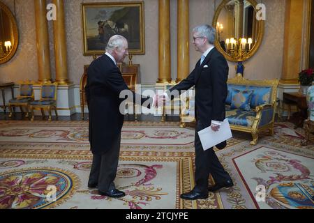 The Ambassador of Sweden, Stefan Gullgren, presents his credentials to King Charles III during a private audience at Buckingham Palace, London. Picture date: Wednesday December 13, 2023. Stock Photo