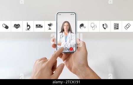 Unrecognizable Man Video Conferencing With Female Doctor On Smartphone, Getting Medical Consultation Stock Photo