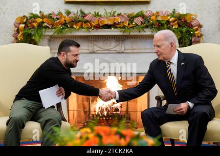 Washington, United States. 12th Dec, 2023. U.S President Joe Biden, right, hosts a face-to-face bilateral meeting with Ukrainian President Volodymyr Zelenskyy, left, at the Oval Office of the White House, December 12, 2023 in Washington, DC Credit: Adam Schultz/White House Photo/Alamy Live News Stock Photo