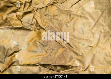 Golden foil backdrop texture creased Stock Photo