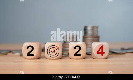 Wooden blocks lined up with the letters 2024, Represents the goal setting for 2024, the concept of a start, financial planning development strategy bu Stock Photo