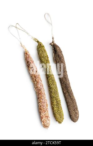 Three different smoked dried sausages isolated on the white background. Stock Photo