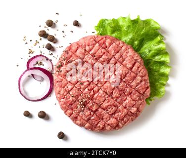 fresh raw burger meat with lettuce leaf and spices isolated on white background, top view Stock Photo
