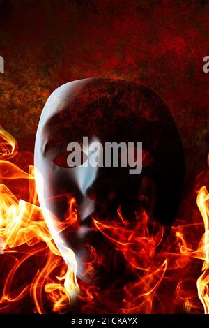 black mask on fire, book cover design Stock Photo