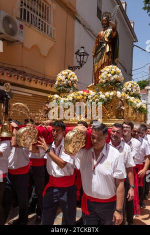 Statue of Saint Bernard on the float being carried into the church in the Romeria San Bernabe; Marbella, Costa del Sol, Malaga Province, Andalusia. Stock Photo