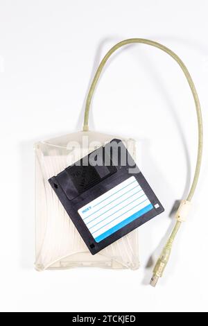 vintage old 1.4Mb floppy disk drive isolated on white studio background Stock Photo