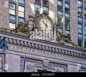 Helmsley Building’s clock on East 46th Street balances the Grand Central Terminal clock on East 42nd Street; Warren & Wetmore designed both buildings. Stock Photo