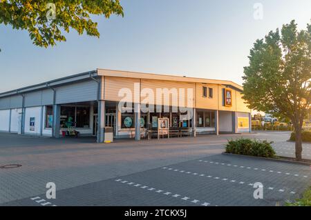 Hanau, Germany - June 26, 2023: Aldi Sud shop at sunrise. Stock Photo