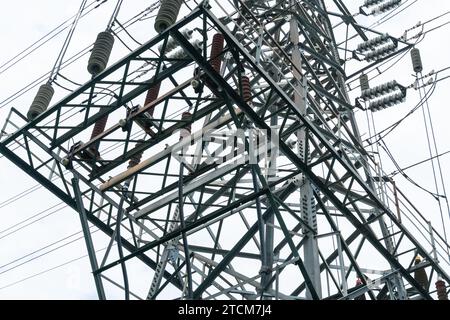 A high resolution, close up shot of modern electrical equipment, illuminated against a clear blue sky Stock Photo