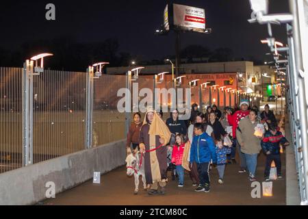 Detroit, Michigan - The Southwest Detroit Holiday Fest, in the city's Mexican-American neighborhood. A posada procession, a Mexican tradition, reenact Stock Photo