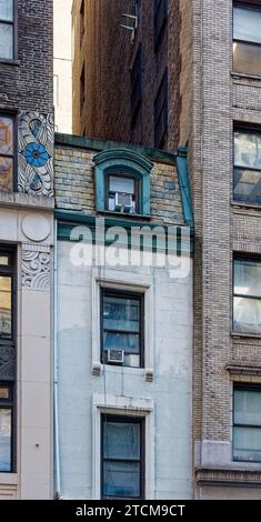 19 West 46th Street, a five-story brownstone only 12-1/2 feet wide, is squeezed between two