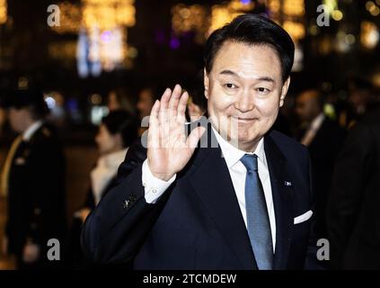 AMSTERDAM - President Yoon Suk Yeol and his wife arrive at AFAS Live for the return performance, during a two-day state visit. The president and his wife offer the royal couple a music and dance performance. ANP EVA PLEVIER netherlands out - belgium out Stock Photo