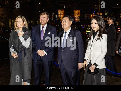 AMSTERDAM - President Yoon Suk Yeol and his wife arrive at AFAS Live for the return performance, during a two-day state visit. The president and his wife offer the royal couple a music and dance performance. ANP EVA PLEVIER netherlands out - belgium out Stock Photo