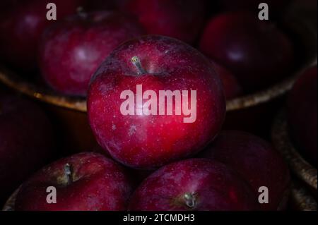 Top view of a red apple surrounded by other apples Stock Photo