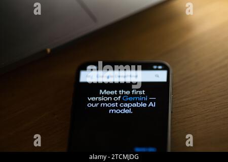 Gemini on mobile phone. Gemini new Google AI model. Stock Photo