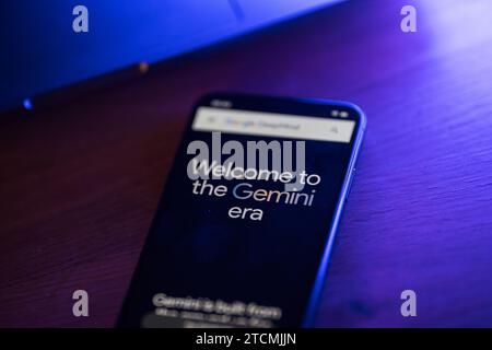 Gemini on mobile phone. Gemini new Google AI model. Stock Photo