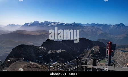 Panorama of Alpine summits in summer under the fog in France in Europe Stock Photo