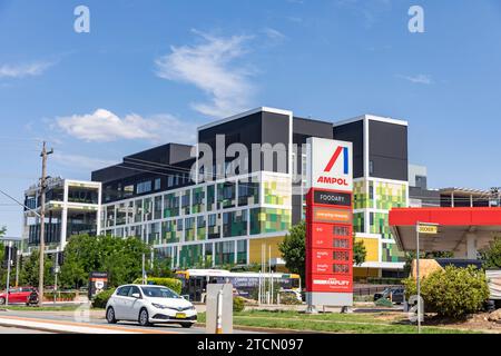Wagga Wagga base australian hospital in the city centre with Ampol fuel petrol station, Wagga Wagga,NSW,Australia Stock Photo