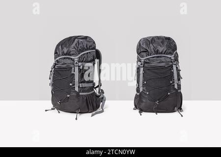Black travel backpack isolated on a white background. Stock Photo
