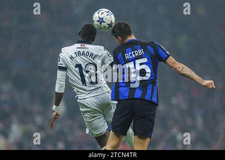 Francesco Acerbi of FC Internazionale (R) and Hamari Traore of Real Sociedad de Futbol (L) in action during the UEFA Champions League 2023/24 Group Stage - Group D football match between FC Internazionale and Real Sociedad de Futbol at Giuseppe Meazza Stadium. Final score; FC Internazionale 0 - 0 Real Sociedad de Futbol. Stock Photo