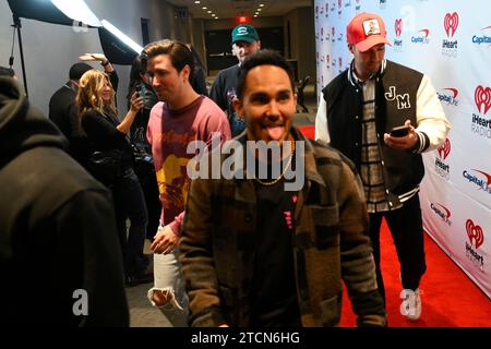 The reunited American boy band Big Time Rush jokes on the red carpet at the iHeartRadio Jingle Ball in Philadelphia on December 12, 2023. Amidst the dazzling lights of Q102's iHeartRadio Jingle Ball, fans and stars alike gather at the Wells Fargo Center in Philadelphia, PA, USA, on December 13, 2023, for a vibrant musical spectacle. The sold-out, multi-city national tour, featuring a star-studded lineup including Usher, OneRepublic, Jelly Roll, Big Time Rush, Doechii, David Kushner, and (G)I-DLE, is spreading holiday cheer ahead of the festive season. (Photo by Bastiaan Slabbers/Sipa USA) Stock Photo