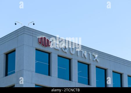 Close up of Equinix logo sign on the building at its headquarters in Redwood City, California, USA. Stock Photo