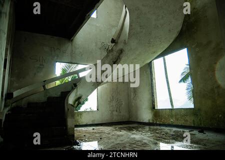 the main staircase of an old, damaged and abandoned building Stock Photo