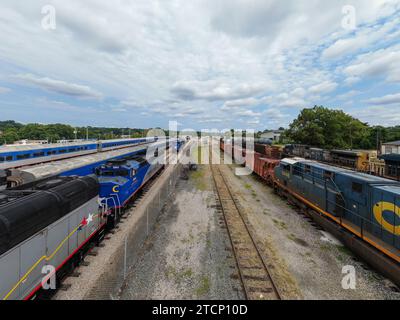 drone photos of various rail cars and amtrak trains on a cloudy day in downtown raleigh north carolina Stock Photo