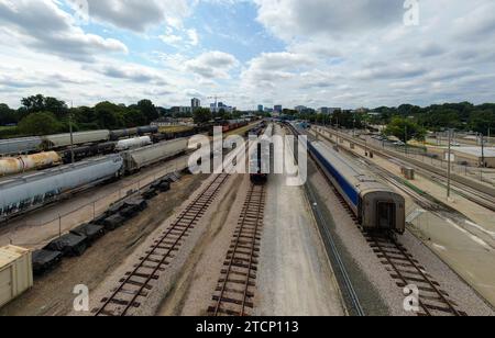 drone photos of various rail cars and amtrak trains on a cloudy day in downtown raleigh north carolina Stock Photo