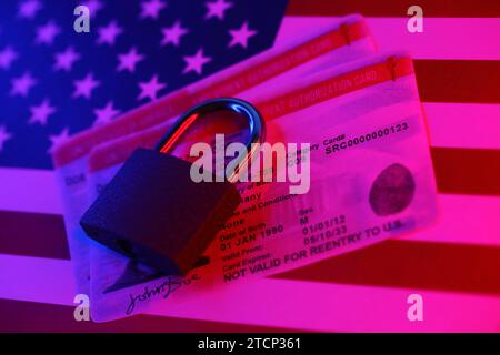 US Employment authorization card with small padlock on United States flag close up Stock Photo