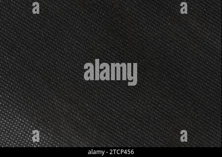 Synthetic black color textile texture macro close up view Stock Photo