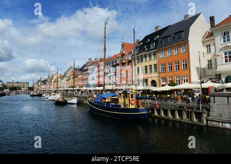 Colourful façades and old ships along the Nyhavn Canal in Copenhagen, Denmark. Stock Photo