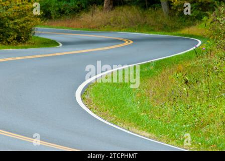 An empty Skyline Drive in Virginia (USA)  twists and turns through Shenandoah National Park. Stock Photo