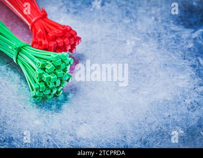 Range of self-locking cable ties on a metallic base Design concept Stock Photo