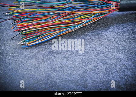 Electrical cables on black surface Electricity concept Stock Photo