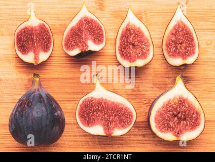 Fresh figs isolated on wooden background. Healthz fruits Stock Photo