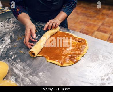 Making sweet homemade salted caramel babka sweet bread cake. Stock Photo