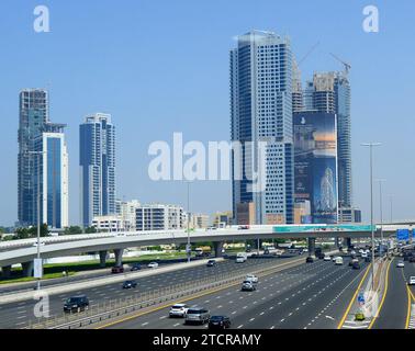 Driving on the E11 Sheikh Zayed Rd highway in the Media city and Internet city in Dubai, UAE. Stock Photo