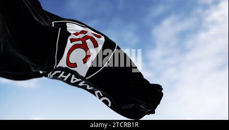 London, UK, sept 5 2023: flag of Fulham Football Club waving. Professional Football club based in London. English Premier League. Fluttering fabric. I Stock Photo