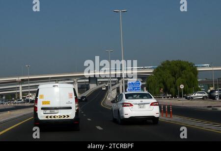 Driving on the E11 Sheikh Zayed Rd highway in the Media city and Internet city in Dubai, UAE. Stock Photo