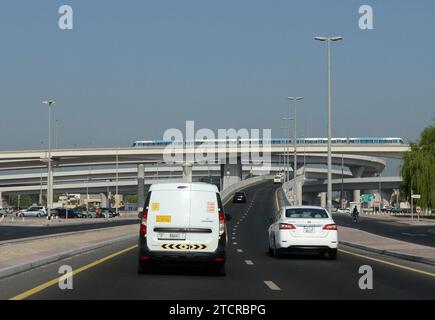 Driving on the E11 Sheikh Zayed Rd highway in the Media city and Internet city in Dubai, UAE. Stock Photo