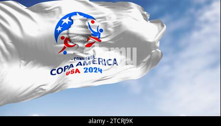 Miami, US, Dec. 3 2023: Copa America USA 2024 Flag waving on a clear day. International men soccer championship.The 2024 edition will be hosted by USA Stock Photo