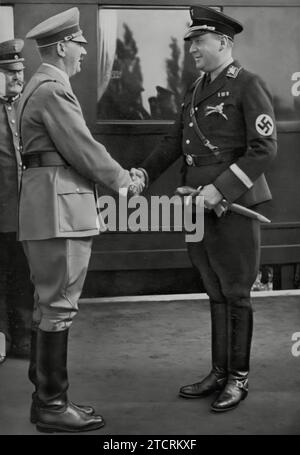 Minister Darre is shown greeting the Führer, Adolf Hitler, at the Harvest Festival celebration. This event was an important occasion in the Nazi calendar, symbolizing the regime's connection to agrarian traditions and values. The presence of both Minister Darre and Hitler highlights the importance the Nazi regime placed on agriculture and the symbolic link they sought to establish between their policies and the prosperity of the farming community. Stock Photo