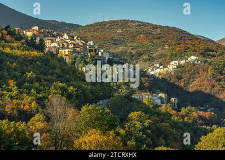 A small mountain village immersed in the autumnal woods of oaks and olive trees. Prezza, province of L'Aquila, Abruzzo, Italy, Europe Stock Photo