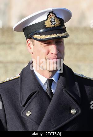 The Prince of Wales attends the Lord High Admiral's Divisions at the Britannia Royal Naval College, Dartmouth, to view a parade of 202 Royal Navy Cadets passing out with International Officer Cadets from Oman, Kuwait, Bangladesh and Trinidad and Tobago. Picture date: Thursday December 14, 2023. Stock Photo