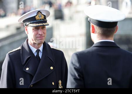 The Prince of Wales attends the Lord High Admiral's Divisions at the Britannia Royal Naval College, Dartmouth, to view a parade of 202 Royal Navy Cadets passing out with International Officer Cadets from Oman, Kuwait, Bangladesh and Trinidad and Tobago. Picture date: Thursday December 14, 2023. Stock Photo